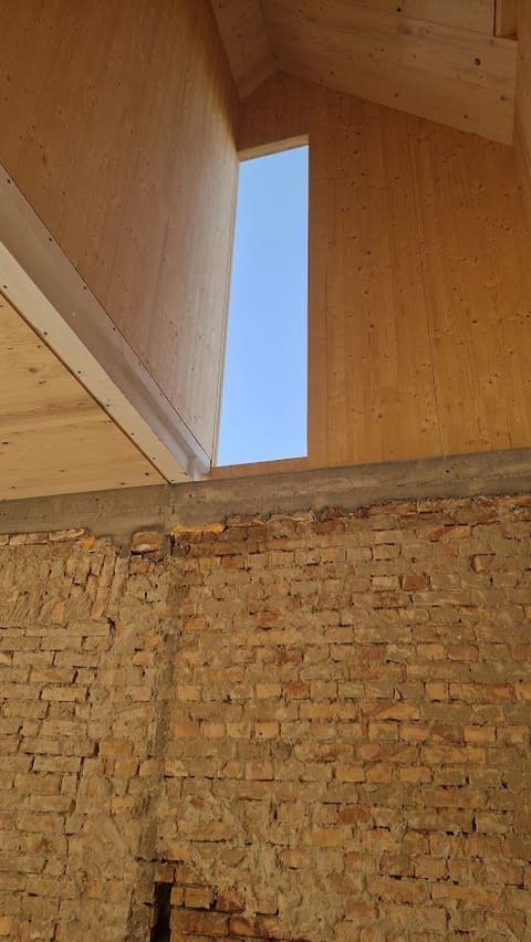 A kibővített épület CLT tetőtere